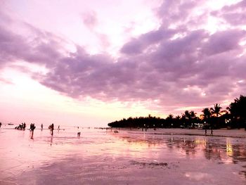 Scenic view of sea against cloudy sky