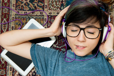 Teenage girl listening to music