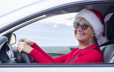 Portrait of woman in car