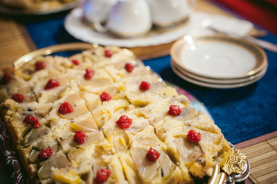 Close-up of cake served on table