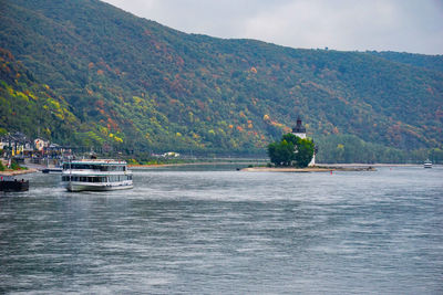 Scenic view of river and mountains