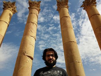 Low angle view of man against sky