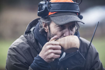 Portrait of man wearing hat outdoors