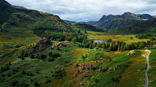 High angle view of trees and mountains against sky