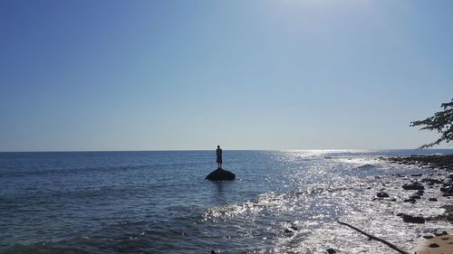 Scenic view of sea against clear sky