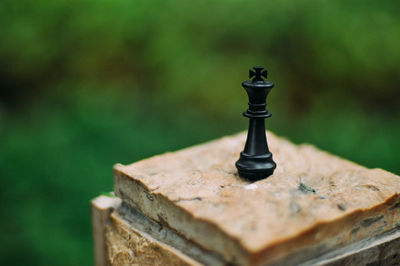 Close-up of chess pieces on table