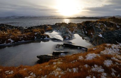 Scenic view of sea against sky during sunset