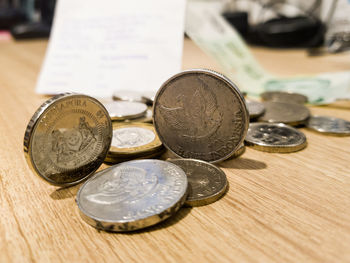 High angle view of coins on table