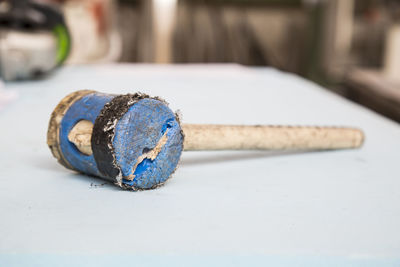 Sledgehammer on table at workshop