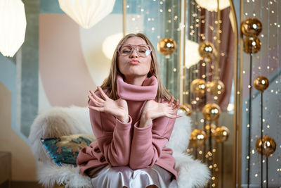 Cheerful woman posing in studio