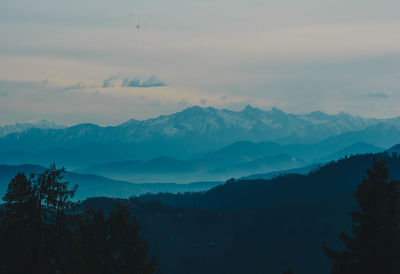 Scenic view of mountains against sky during sunset