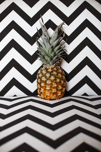 Close up of pineapple on zigzag pattern