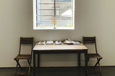 Empty chairs and table at home