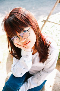 Portrait of young woman looking away