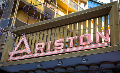 Low angle view of text on building