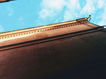 Low angle view of roof against sky