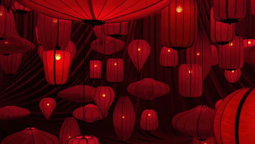 Full frame shot of red lanterns hanging at night