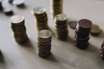 High angle view of coins on table