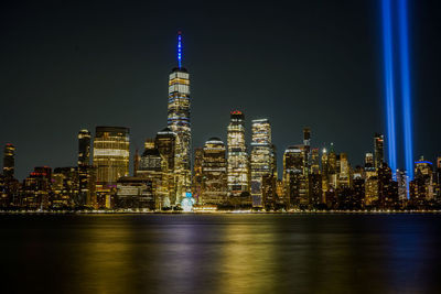 Illuminated buildings in city at night