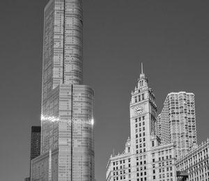 Low angle view of modern buildings against clear sky