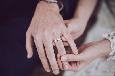 Close-up of hand holding hands