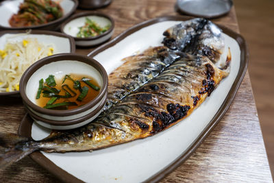 High angle view of fish in bowl on table