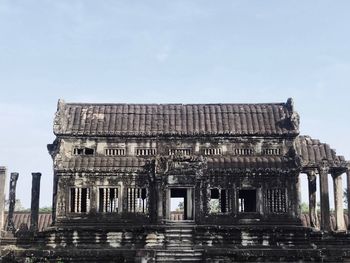 Low angle view of old building against sky