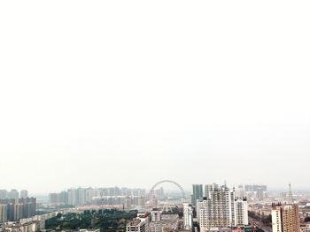 Cityscape against clear sky