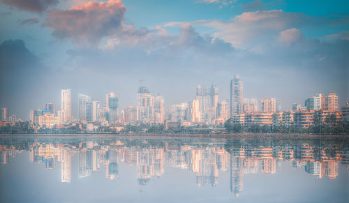 Reflection of illuminated buildings in water