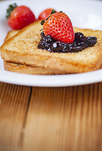 Close-up of strawberries in plate