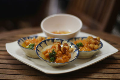 Close-up of food served on table