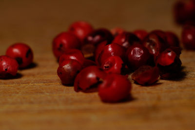 Close-up of cherries on table