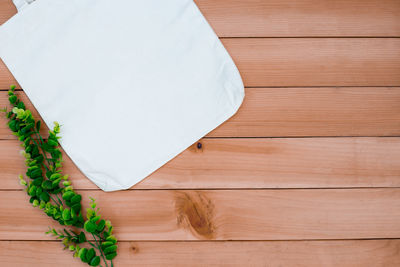 High angle view of bread on wooden table