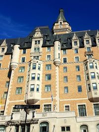 Low angle view of residential building against sky