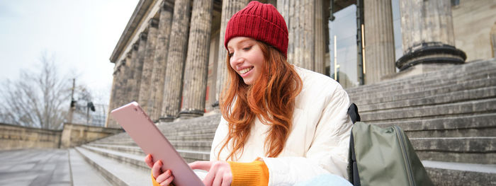 Young woman using mobile phone