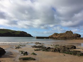Scenic view of beach against sky