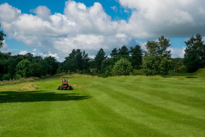 Lawn mower on golf course