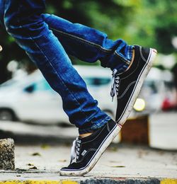 Low section of person on skateboard