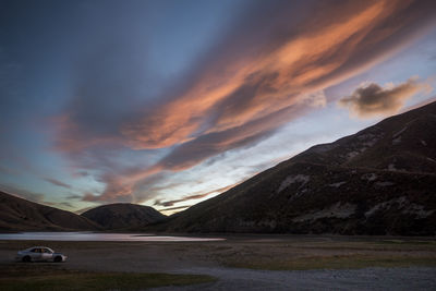 Scenic view of mountains against sky during sunset