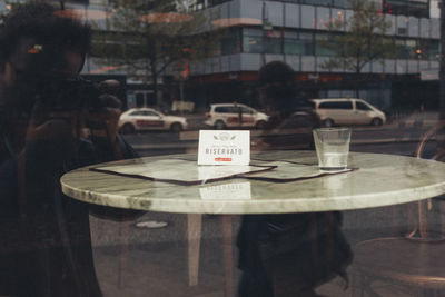 Close-up of drink served on table at cafe