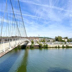 Bridge over river against sky