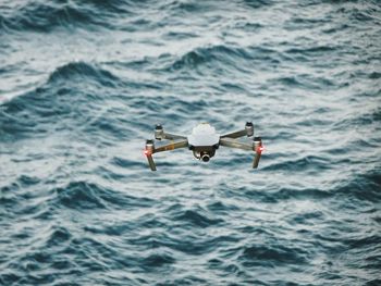 High angle view of man surfing in sea