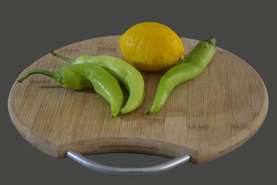 High angle view of fruits on table against black background