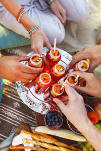 High angle view of people holding ice cream