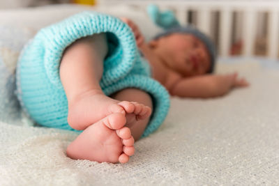 Baby boy sleeping in crib