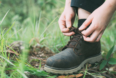 Low section of person wearing shoes