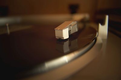 Close-up of turntable on table
