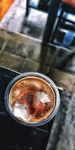 High angle view of coffee cup on table