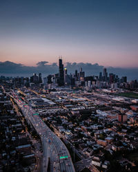 High angle view of buildings against sky during sunset