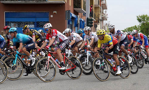 People riding bicycles on street